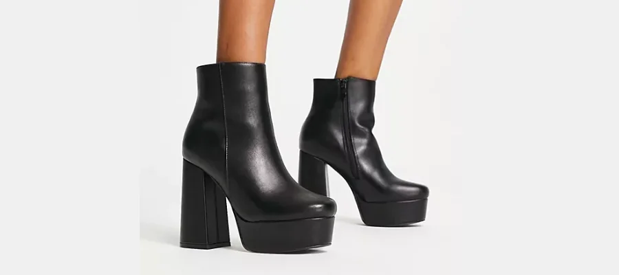 High heeled black boots for women 