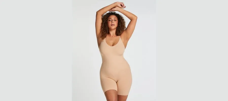 Seamlessly accentuating bodysuit with high leg cut - Beige
