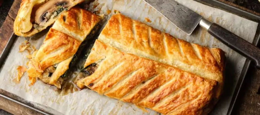 A Symphony of Flavours: Mushroom Wellington Recipe with Onion Gravy and Mash